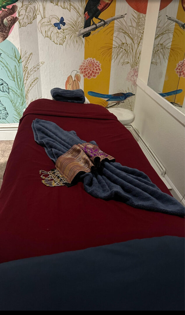 A massage bed with towel on it